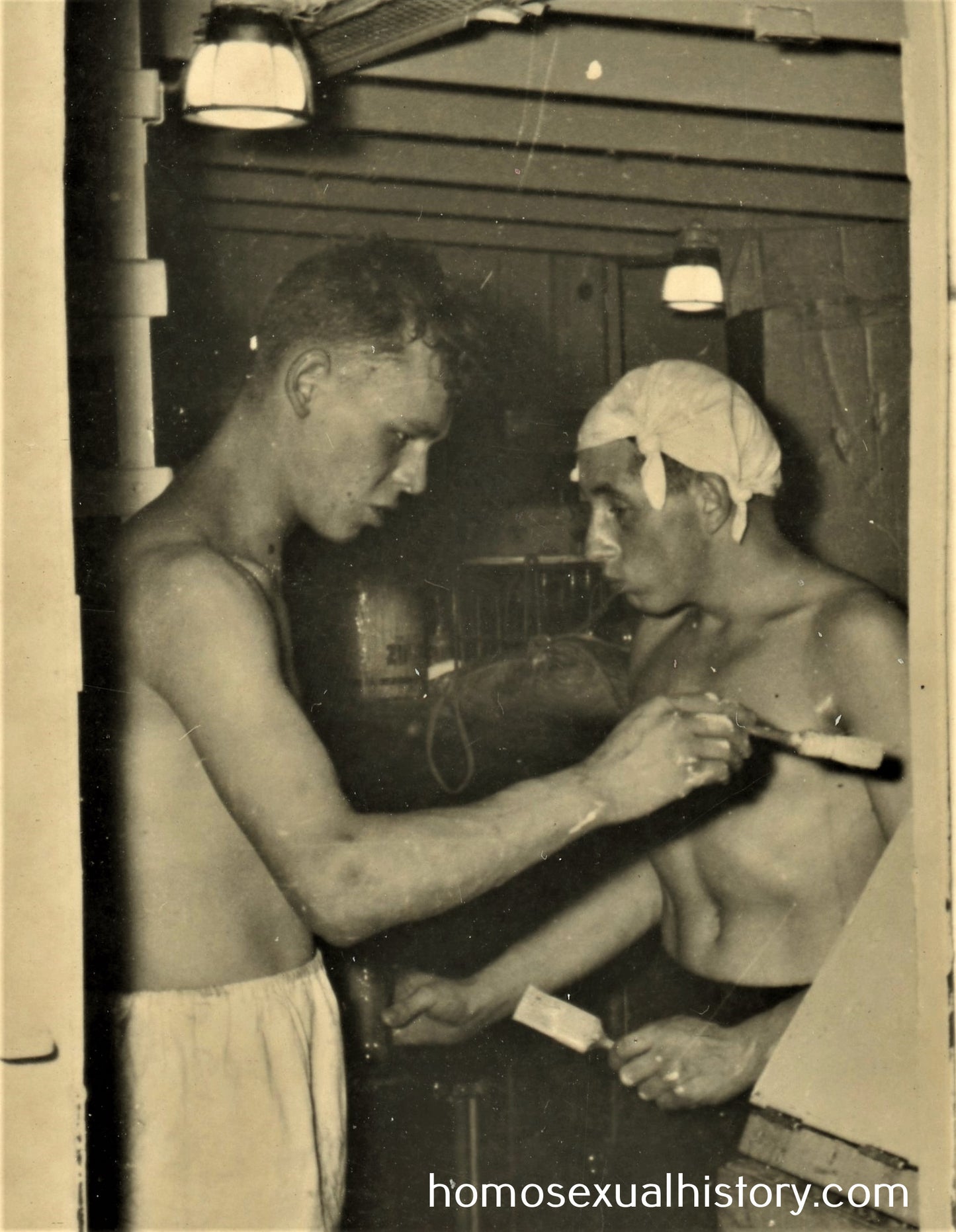 France 1930s. Stand Alone - France. Two shirtless sailors painting. Buddies