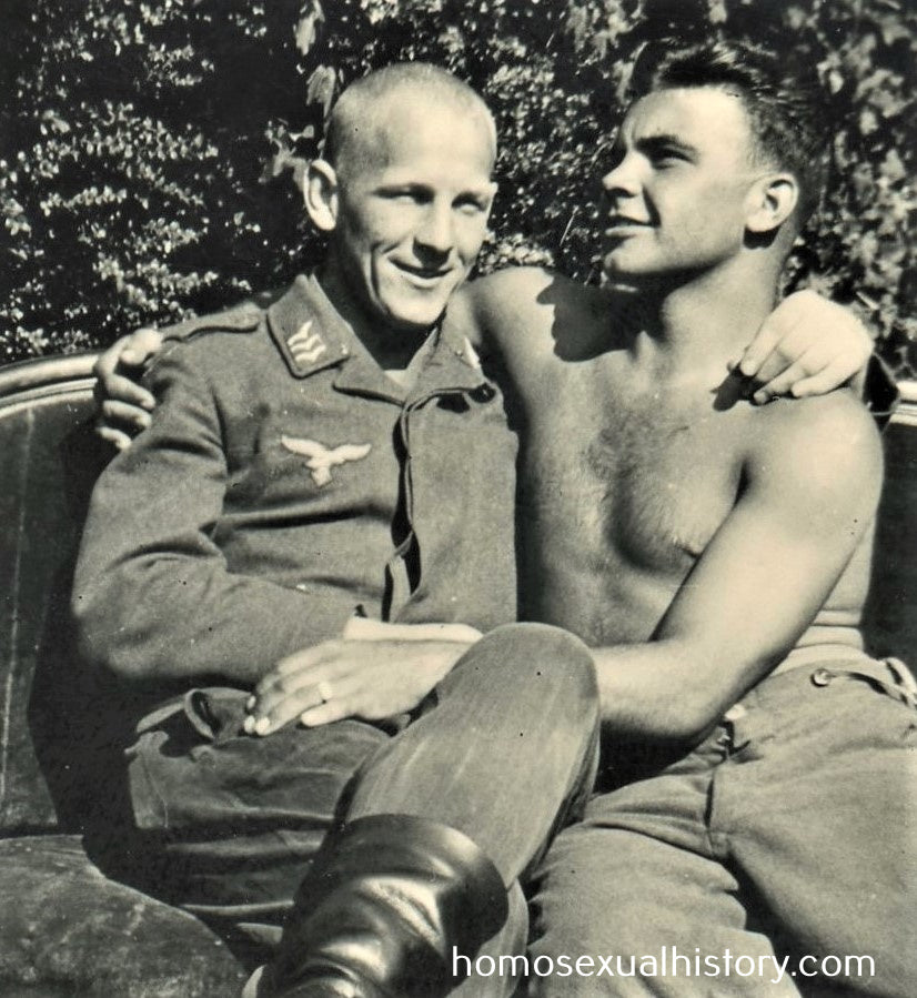 Germany - Military. 1940s WWII. Two affectionate soldiers hug. Gay. Shirtless. Arms on shoulder and leg.