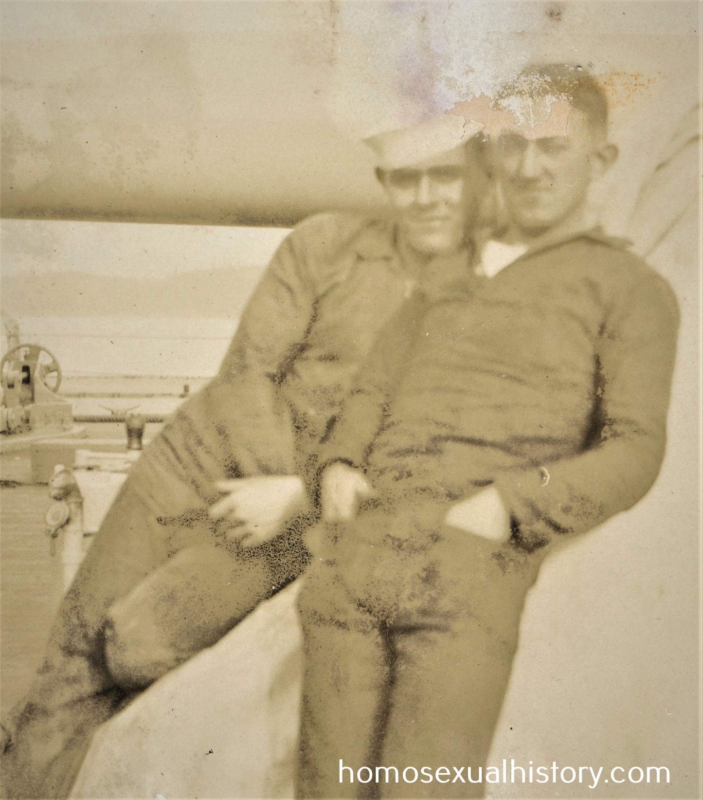USA - Military. 1920s. Two affectionate sailors lean in to each other. Two affectionate sailors.