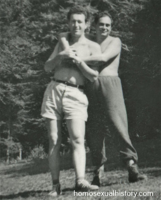 Bulgaria 1950s. Two men hug in outdoors park