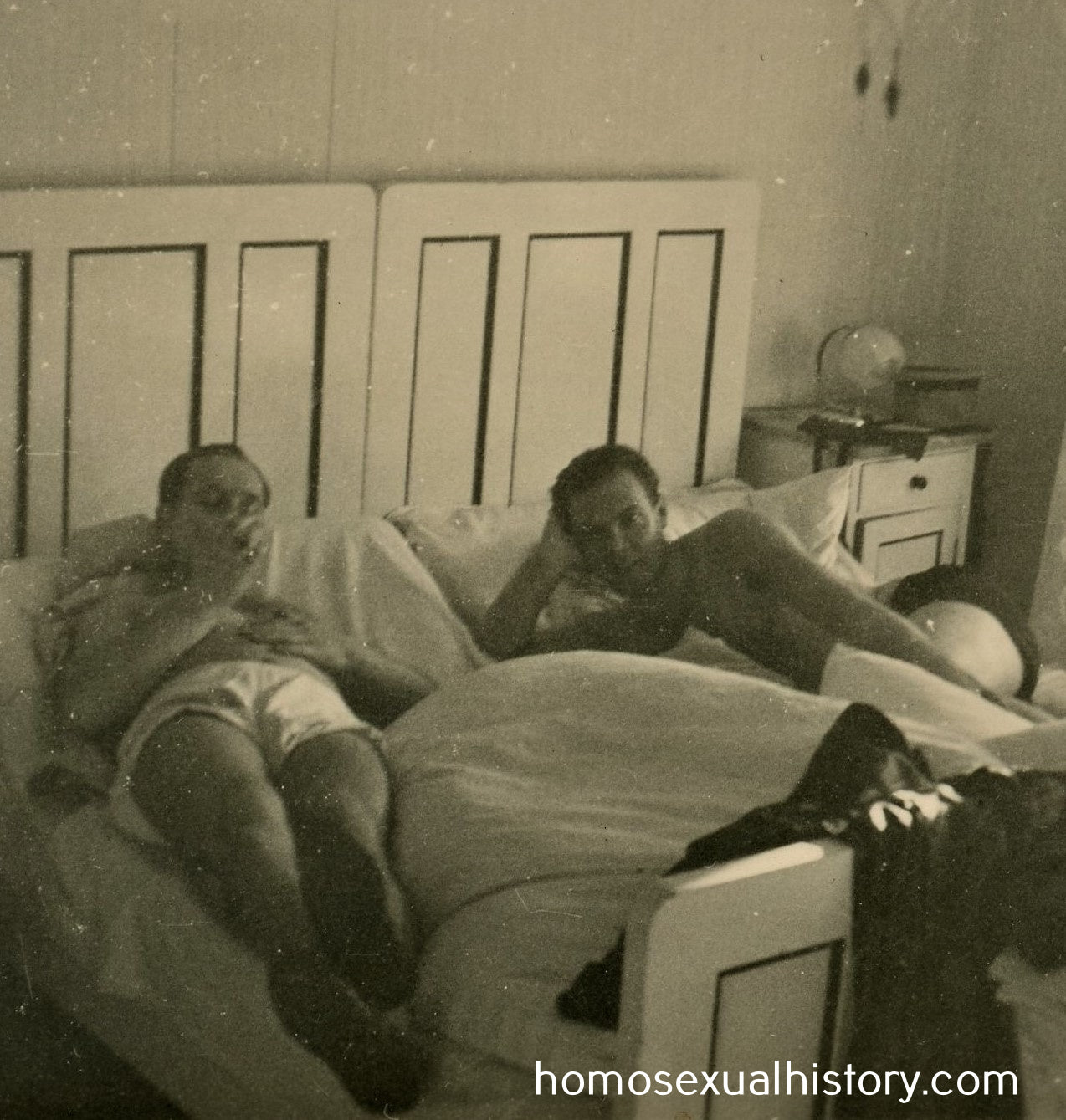 Germany 1920s. Two men in bed.