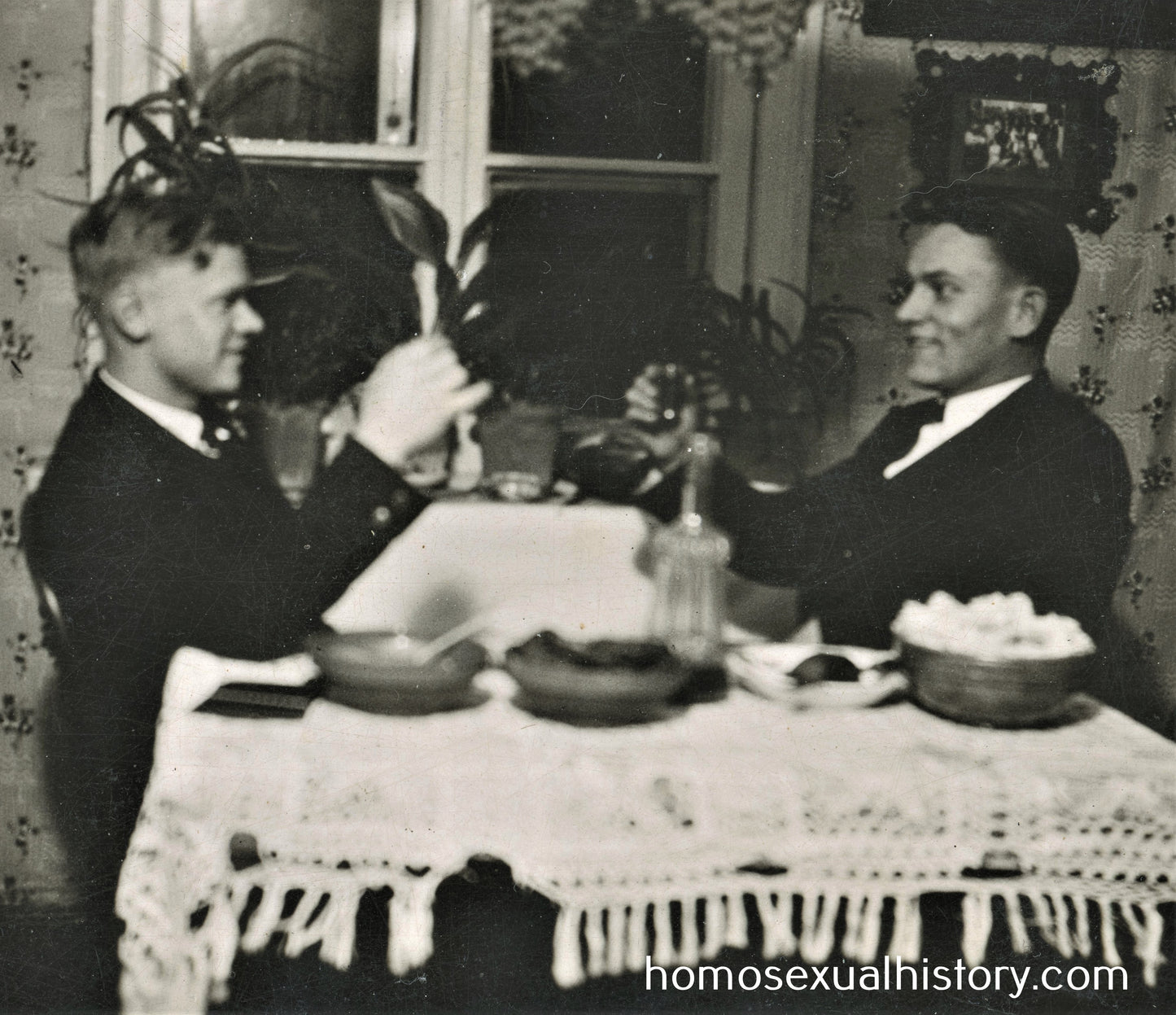 Germany 1934. Two men dining together. Closeness.