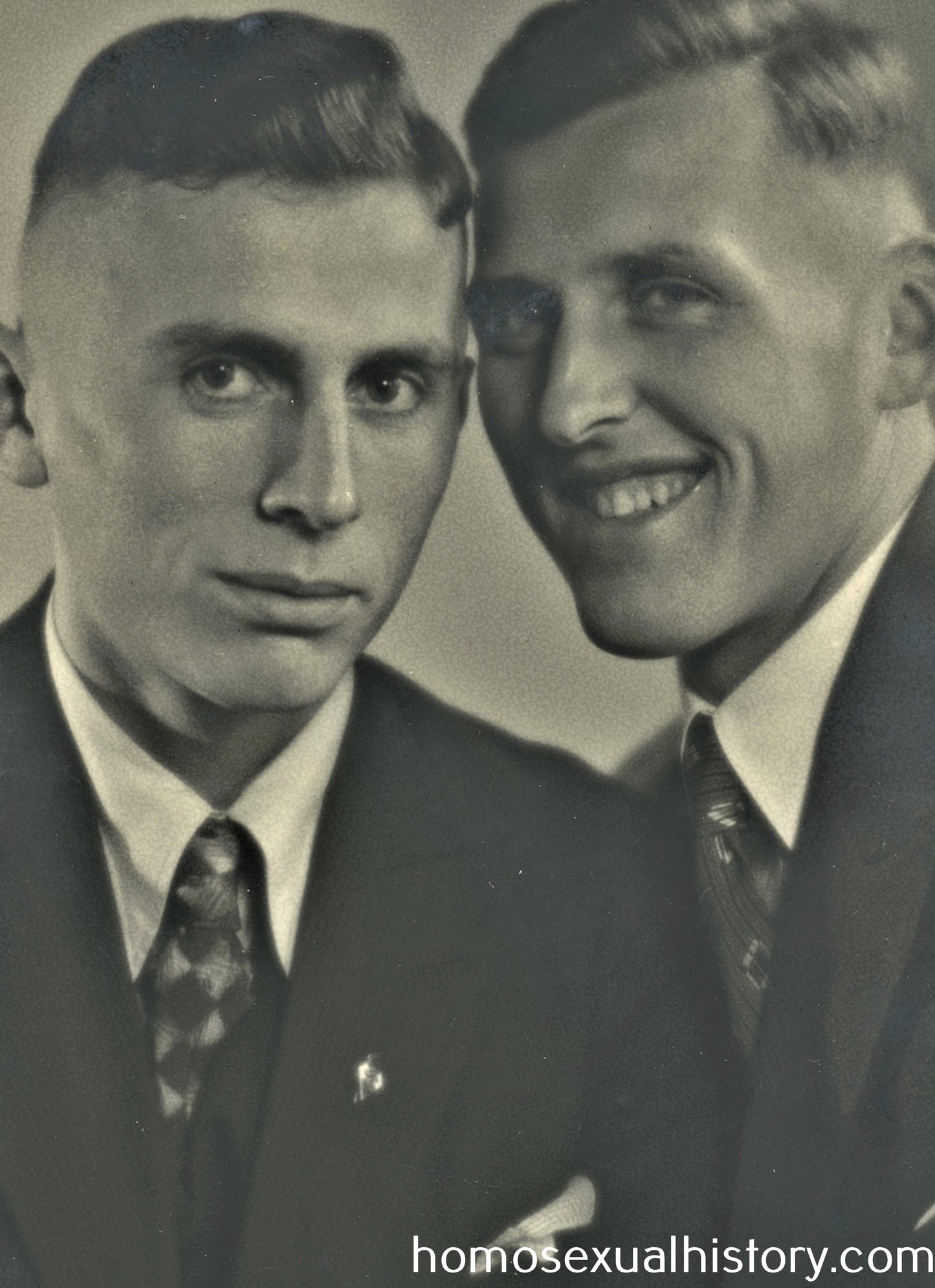 Germany 1936. Studio portrait of two affectionate friends.