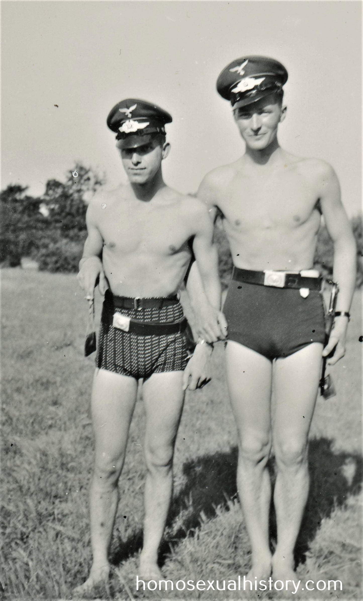 Germany - Military. 1940 WWII. Two soldiers in bathers and hats. Shirtless.